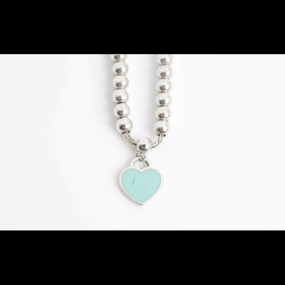 Tiffany’s bracelet. I had it polished atTiffany& Co. Jewelry store. Never wore.